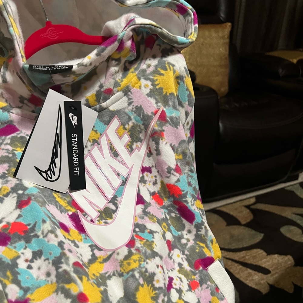 Girl size Medium Nike Sweater Brand New Never worn.